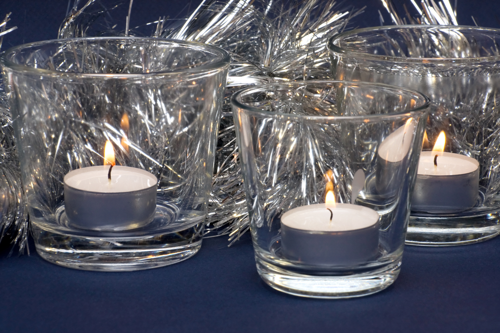 Candles with tinsel