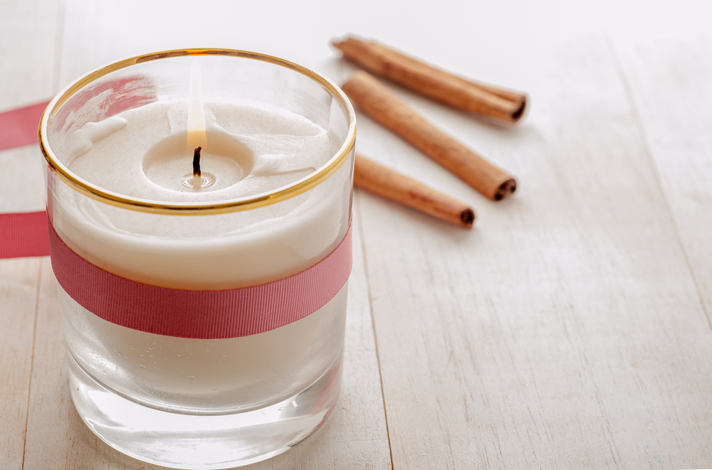 Winter candle with a ribbon